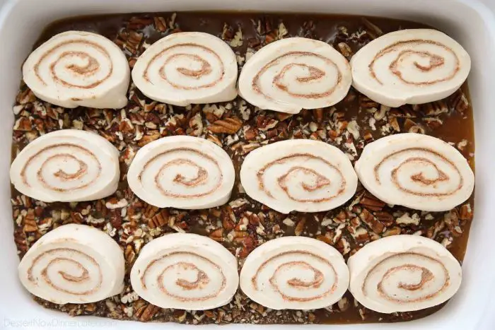 Rhodes Frozen Cinnamon Rolls on top of a caramel and pecan mixture.