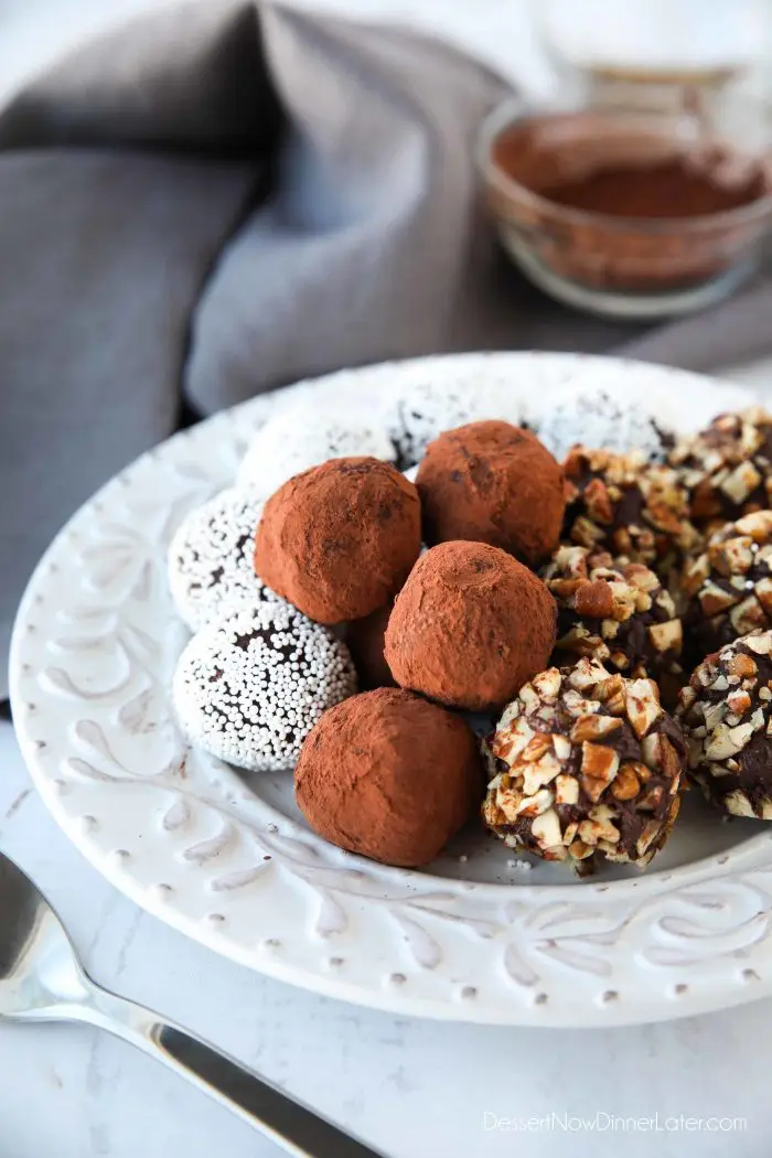 Easy chocolate truffles are made with ganache and a variety of toppings.