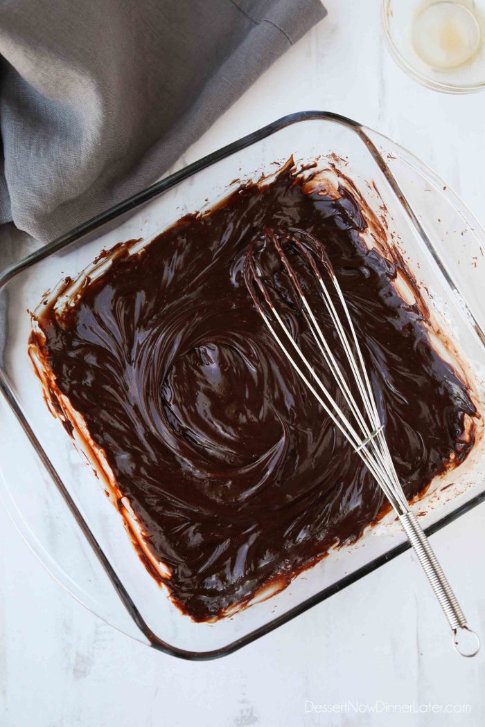 Chopped chocolate and hot cream is whisked together with vanilla for extra flavor.