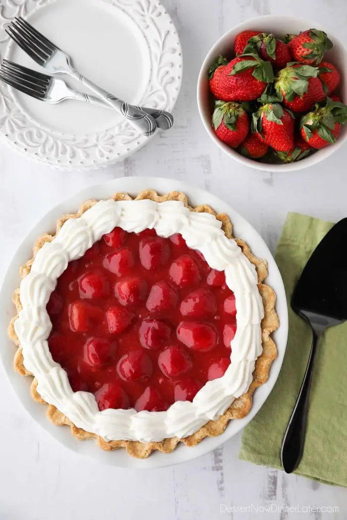 Strawberry Cream Pie - layers of pie crust, no-bake cheesecake, strawberries, glaze, and whipped cream.
