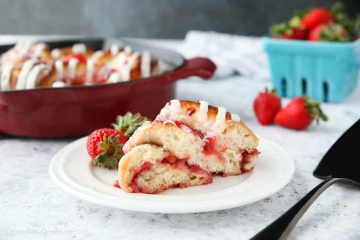 Strawberry Swirl Bread is a twist on classic sweet rolls. Sweet strawberry preserves and chunks of fresh strawberries are twisted inside of soft yeast bread, then baked until golden. Top it with a creamy icing and this easy sweet bread is perfect for breakfast or dessert.