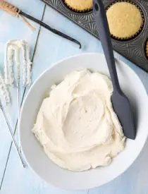 This Vanilla Buttercream Frosting recipe is easy, creamy, and extremely versatile. Made with basic ingredients, this vanilla frosting is a staple for decorating cakes, cupcakes, or cookies.