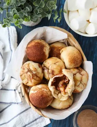 Empty Tomb Rolls (aka Resurrection Rolls) are delicious cinnamon-sugar sticky buns with a melting marshmallow inside. A family-friendly recipe that teaches the story of Easter. So easy to make with Rhodes rolls.