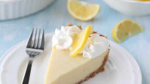 Lemon Cream Pie is tangy and sweet with a buttery graham cracker crust. It's just like key lime pie, but made with lemons, and topped with fresh sweetened whipped cream. A super easy spring or summer dessert, and great alternative to lemon meringue pie.