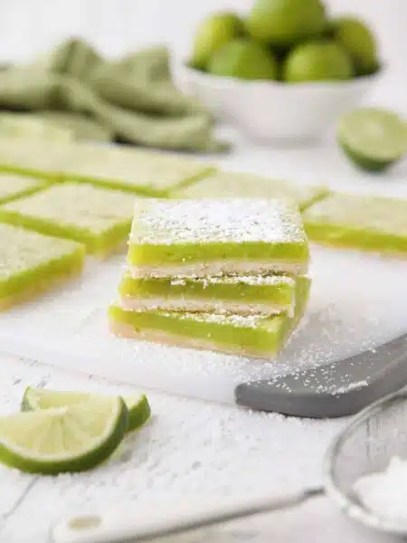 Lime Bars are exactly like lemon bars, but made with limes instead. A shortbread crust is topped with a tangy lime custard. Easy and delicious!