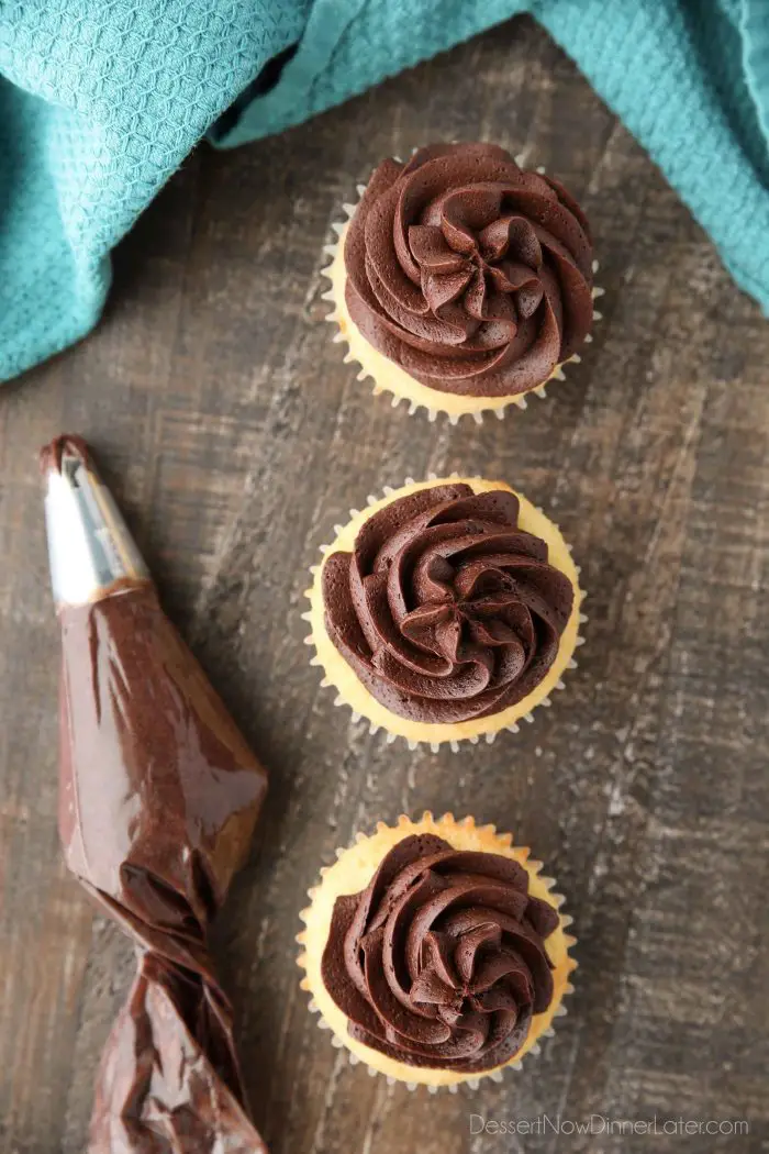 Chocolate Buttercream Frosting piped onto cupcakes with a Wilton 2D tip.