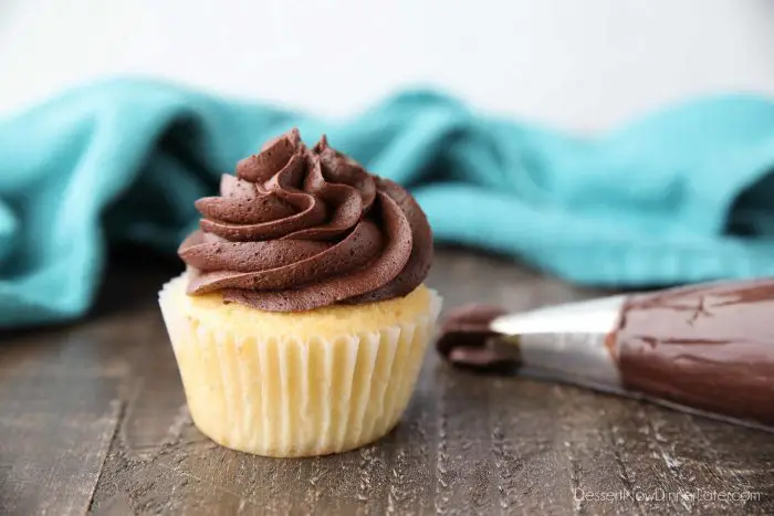 Yellow Cupcake with Chocolate Frosting piped on top.