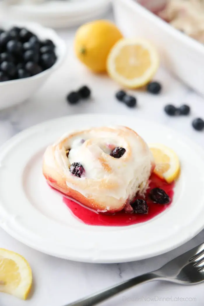 Lemon Blueberry Sweet Rolls are sweet and tangy with a gooey blueberry sauce, and zesty lemon cream cheese frosting.