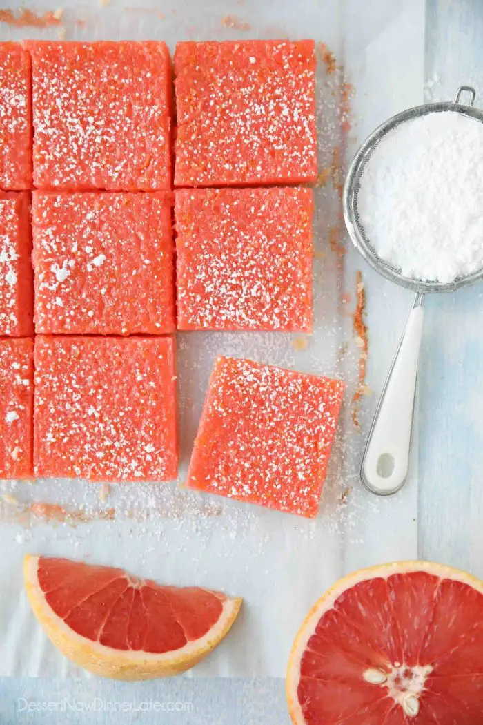Grapefruit bars (just like lemon bars) cut into squares with a dusting of powdered sugar on top.