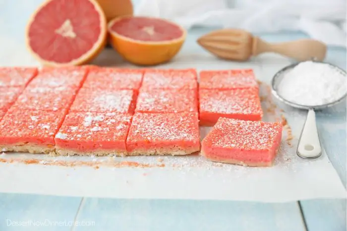 Grapefruit bars (just like lemon bars) cut into squares with a dusting of powdered sugar on top.