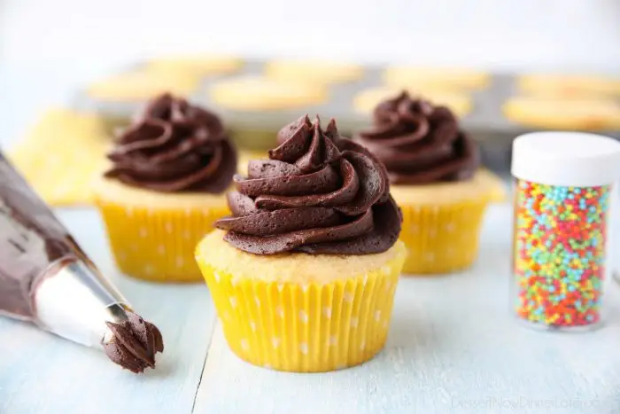 This Yellow Cupcakes Recipe is an old-fashioned, from-scratch butter cake. A classic homemade cupcake for birthday parties, topped with chocolate buttercream (or your other favorite frosting.)