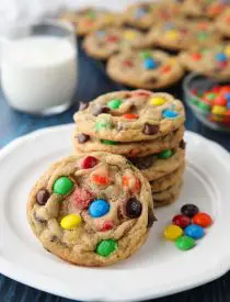 These bakery style M&M Cookies are loaded with chocolate chips and M&M candies. They're crispy on the edges, soft and chewy in the center, with plenty of chocolate throughout. The best M&M cookies! No chill time required -- just make and bake.