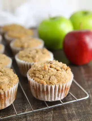 Apple Cinnamon Muffins are full of apples, spices, and a crumb topping.