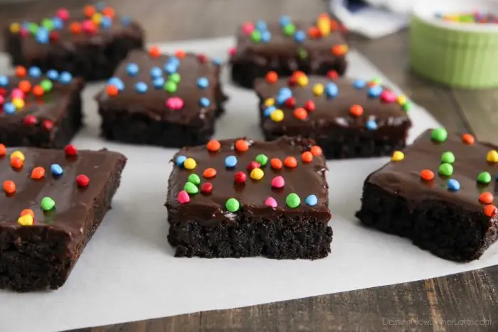 Cosmic Brownies - Dark chocolate brownies made from scratch, frosted and decorated with candy coated chocolate chips.