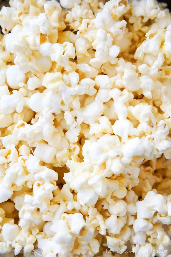Marshmallow Popcorn is sweet and salty like caramel corn, but made without brown sugar and uses mini marshmallows for an extra soft and gooey snack.