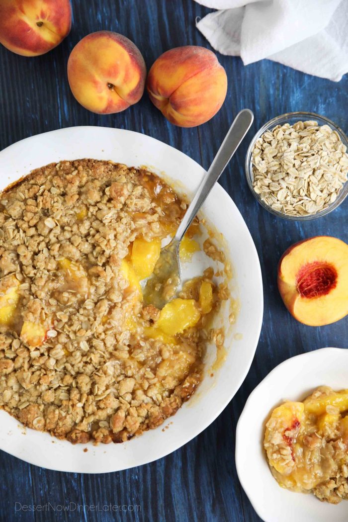 Fresh peach crisp made with a buttery brown sugar and cinnamon oat topping.
