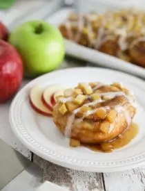 Caramel Apple Cinnamon Rolls are a twist on caramel pecan rolls, with fresh apples instead of nuts. They’re made easy with frozen cinnamon rolls so half the work is done for you! A great breakfast or dessert in the Fall, on holidays, or the weekend.