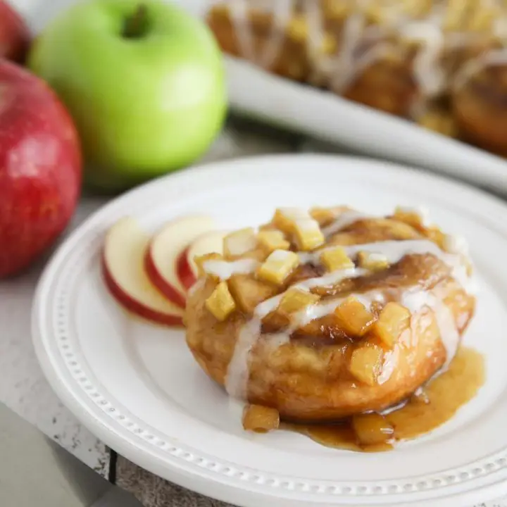 Caramel Apple Cinnamon Rolls are a twist on caramel pecan rolls, with fresh apples instead of nuts. They’re made easy with frozen cinnamon rolls so half the work is done for you! A great breakfast or dessert in the Fall, on holidays, or the weekend.