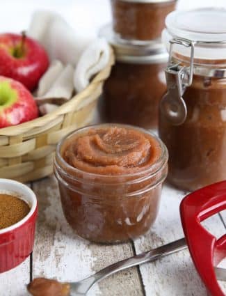 Apple butter is thicker than applesauce with a rich caramelized flavor and warm fragrant spices. It's used as a spread, topping, or snack. This homemade apple butter recipe is easy to make from scratch on the stovetop in as little as two hours.