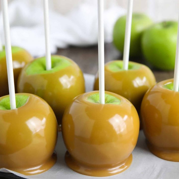 Classic homemade caramel apples are fun to make from scratch. Any leftover caramel can be cooled, cut, and wrapped for treats. Plus tips and tricks to make professional looking caramel apples at home.