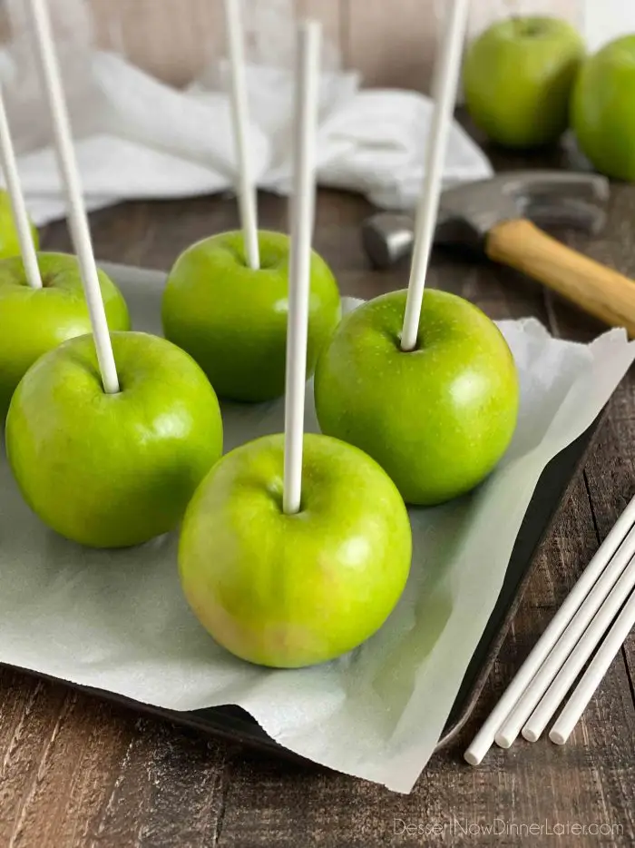 Use 6 to 8-inch Wilton cookie sticks for handles in the caramel apples. Gently tap into apple with a hammer or the flat end of a meat mallet.