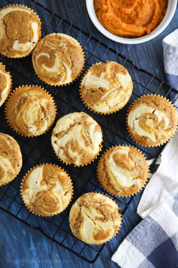 Pumpkin cream cheese muffins are light, fluffy, and moist, full of pumpkin spice flavor, and swirled with creamy cheesecake.