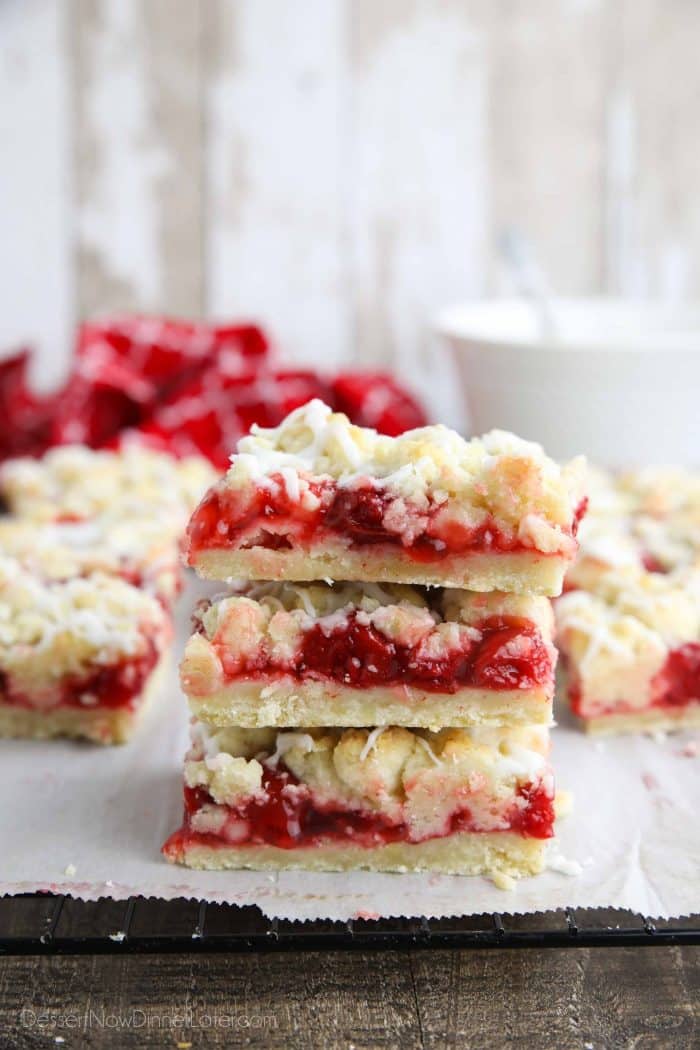 Three cherry pie bars stacked on top of each other.