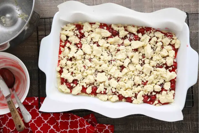 Shortbread crumbs sprinkled on top of cherry pie filling.