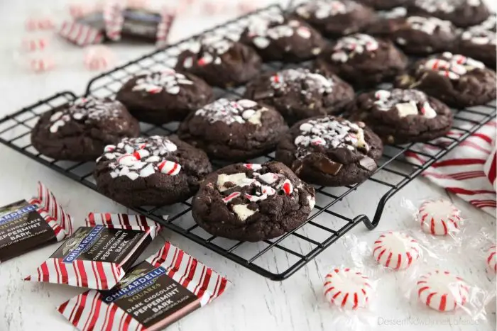 Cooling rack full of chocolate peppermint cookies.