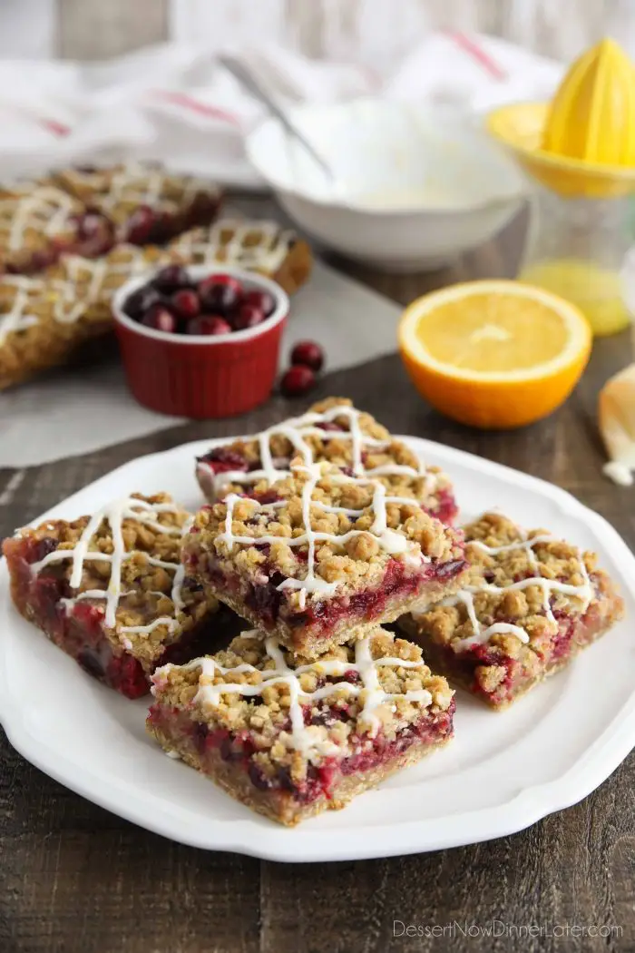 Plate of glazed cranberry crumb bars.