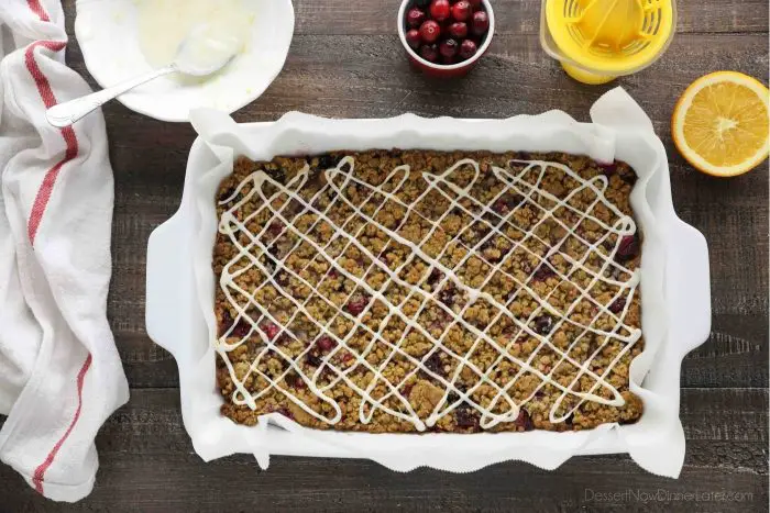 Top view of pan of glazed cranberry bars.