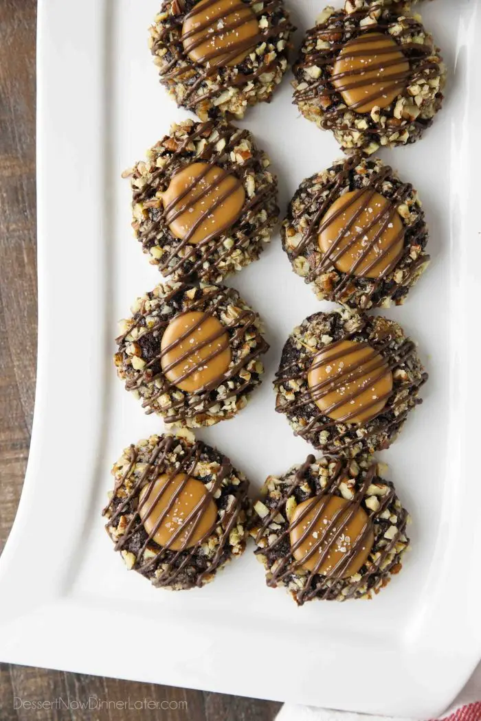 Turtle Thumbprint Cookies on long white rectangle platter.