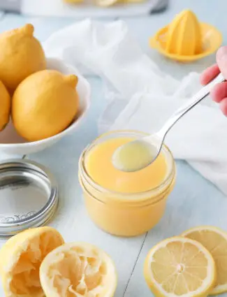 Homemade Lemon Curd on a spoon.
