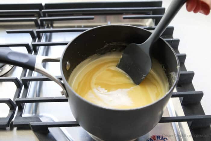 Lemon curd thickening on the stove top.