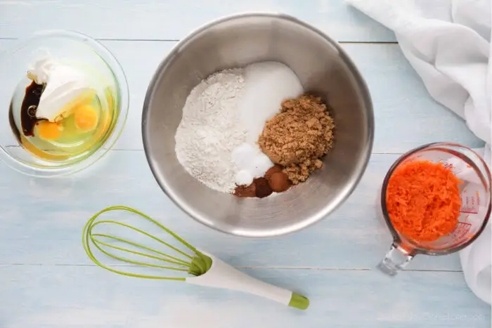 Carrot Cake Cupcakes made in two bowls. One with the wet ingredients. One with the dry ingredients.