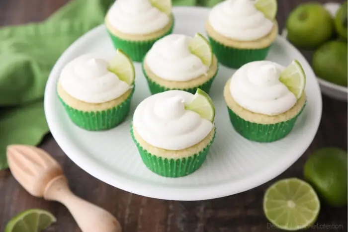Top view of key lime cupcakes on cake stand.