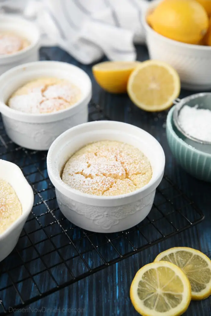 Lemon pudding cakes dusted with powdered sugar.