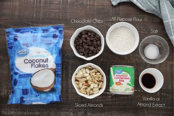 7 ingredients for Almond Joy Cookies: Shredded coconut, chocolate chips, sliced almonds, sweetened condensed milk, all-purpose flour, salt and vanilla or almond extract.