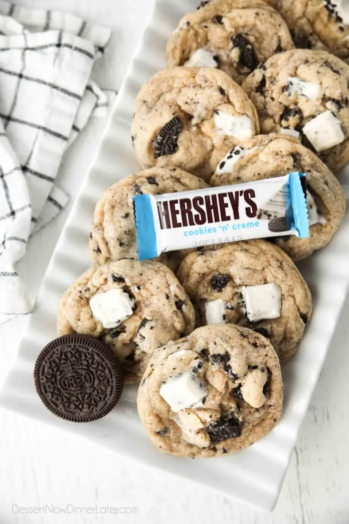 Plate of cookies and cream cookies with an Oreo and Hershey's Cookies 'n' Creme candy bar.