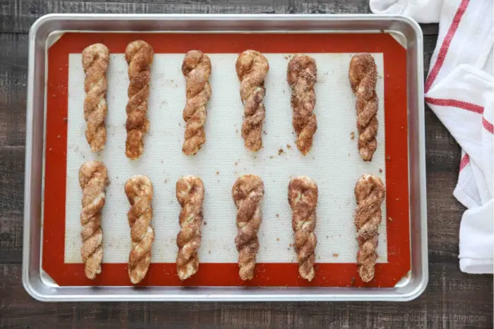 Cinnamon Twists prepared on sheet tray prior to baking.