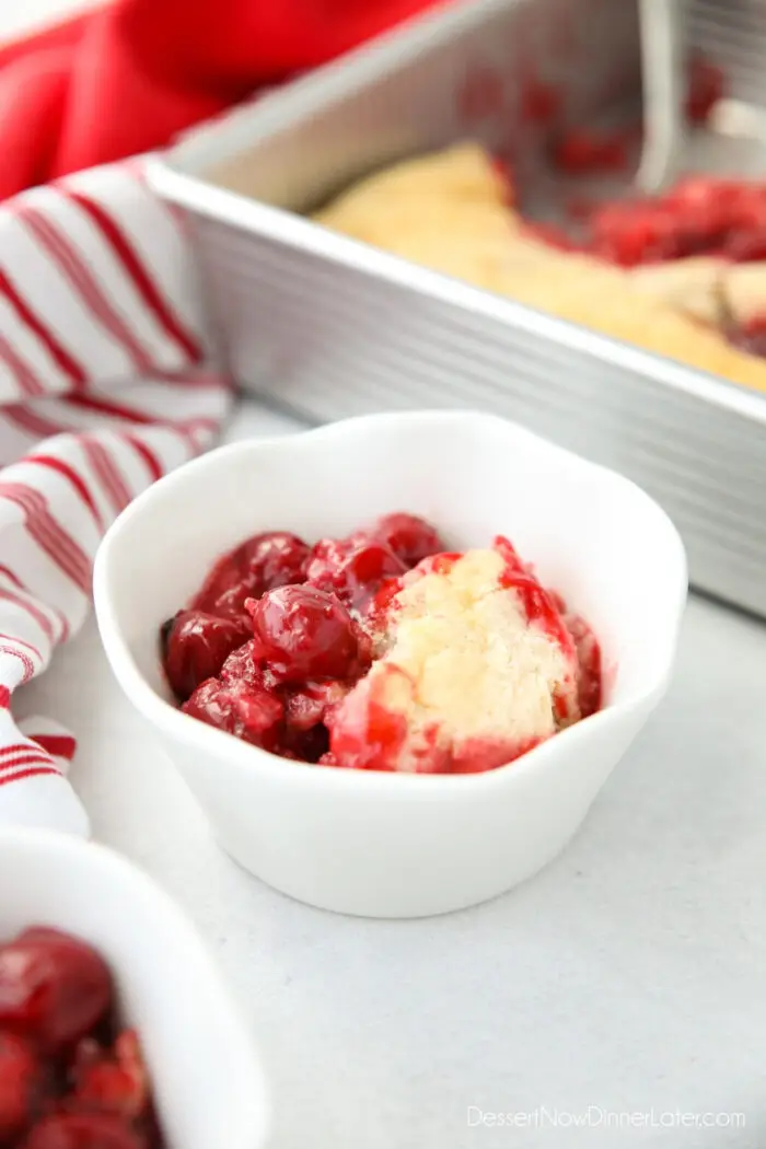 Cherry Cobbler in a bowl made from cherry pie filling and homemade cake batter.