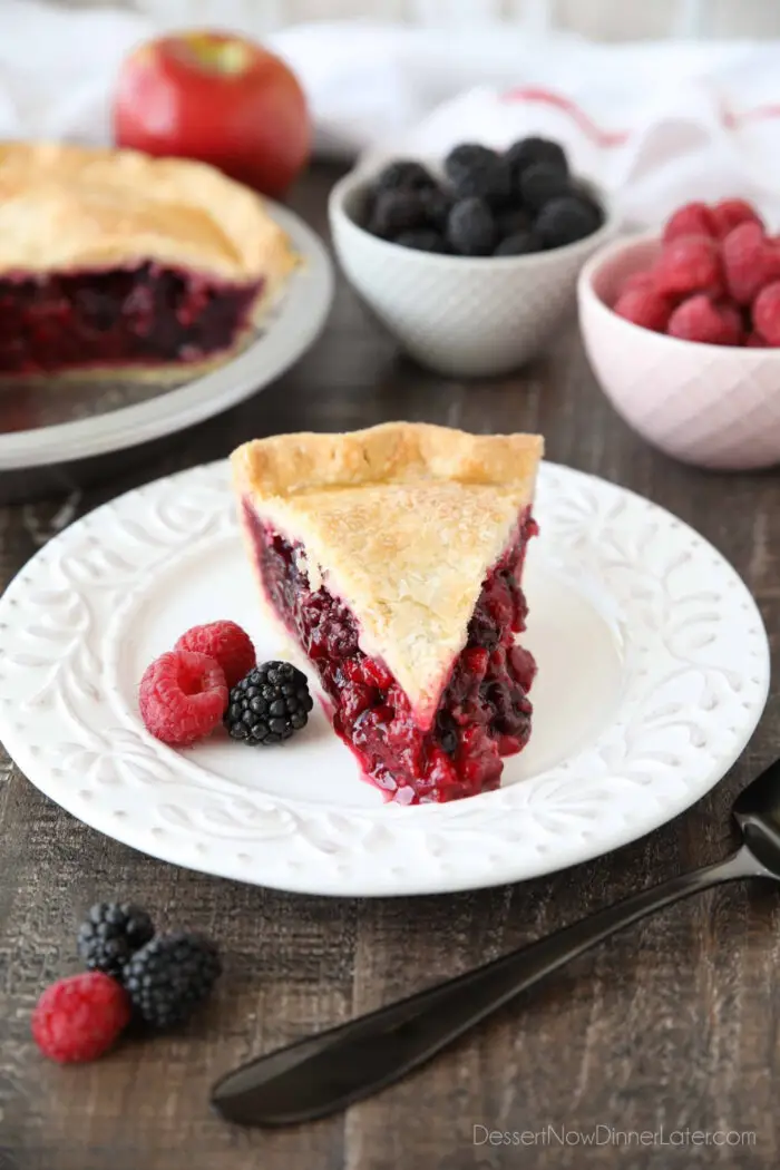 Slice of Razzleberry Pie on a plate. Focusing on the berry pie filling.