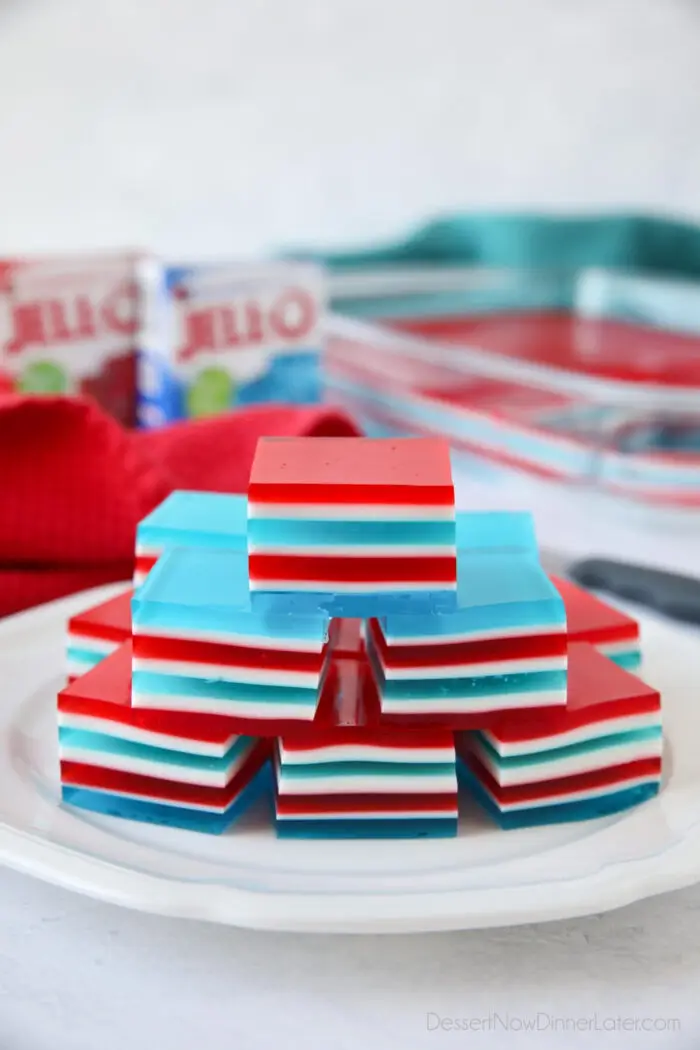 Red, white, and blue finger jello on a plate.