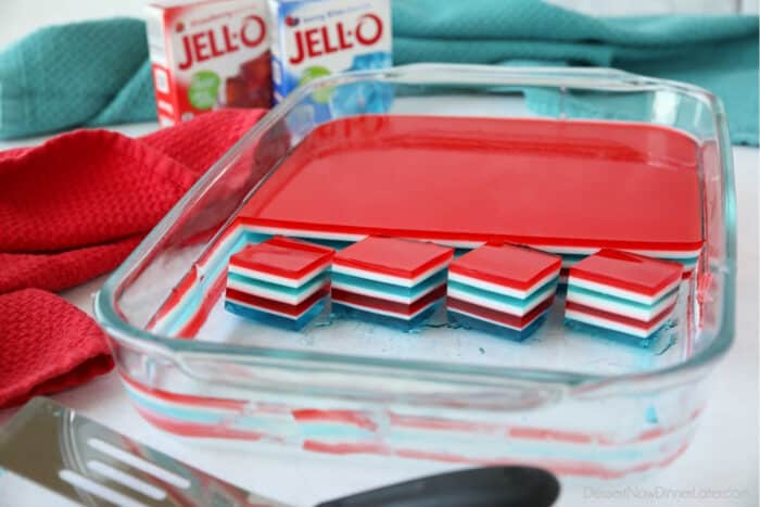Patriotic jello with red, white, and blue colors in a 13x9 dish.