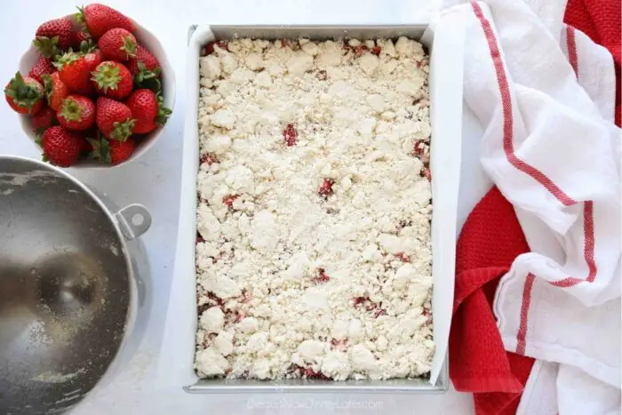 Remaining crumb streusel sprinkled over the top of the strawberries prior to baking.