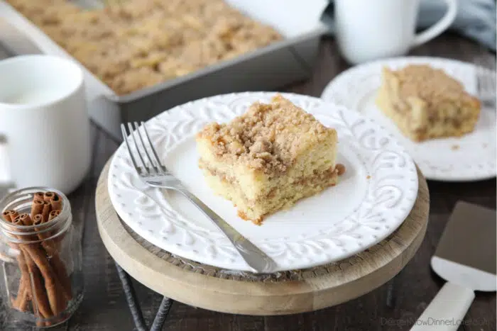 Plate of streusel topped cake with a fork on the side.