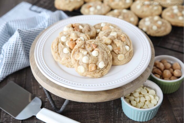 Focus on White Chocolate Chip Macadamia Nut Cookies on a plate.