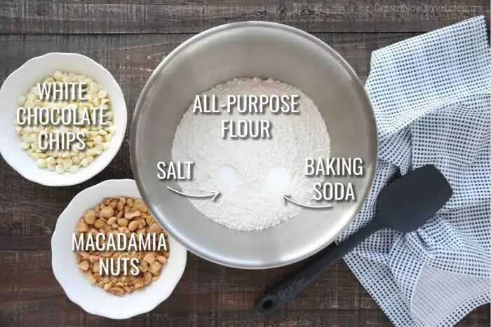 Dry Ingredients for White Chocolate Macadamia Nut Cookies: all-purpose flour, salt, baking soda, white chocolate chips, and macadamia nuts.
