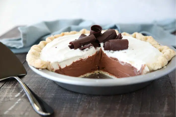 Side view of Chocolate Cream Pie with chocolate curls on top.