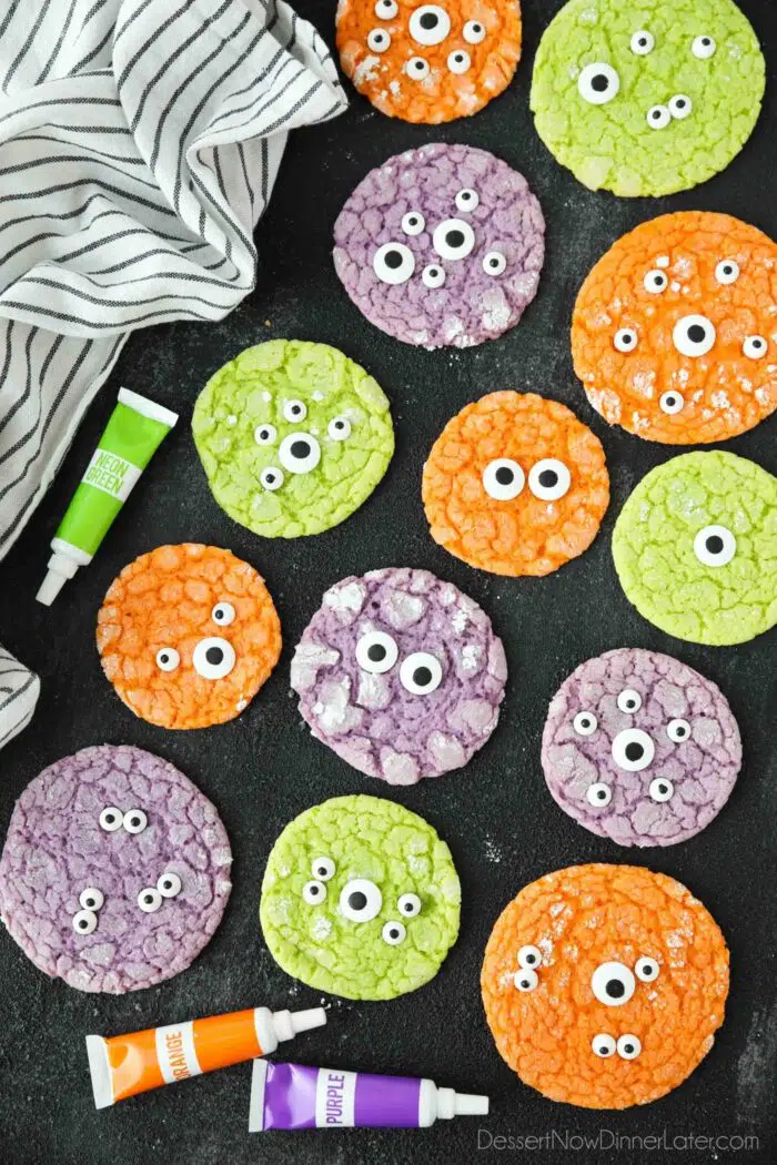 Halloween Monster Cookies with neon colors topped with big and small candy eyes.